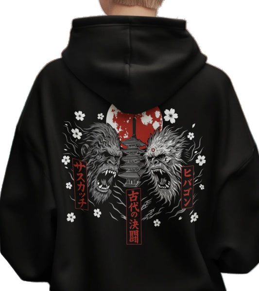 Close-up of Bigfoot and Hibagon cryptid artwork with Japanese-inspired details on a black hoodie