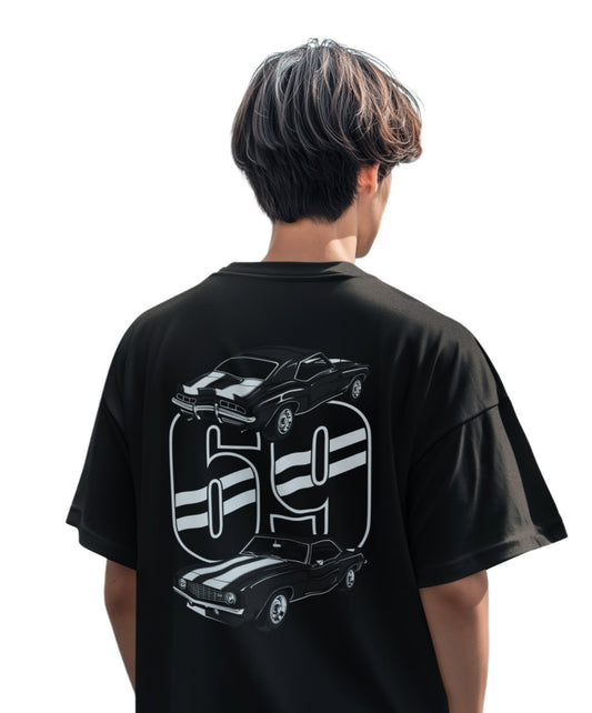 Model wearing the black 1969 Camaro graphic T-shirt by Weirdo 4 Life